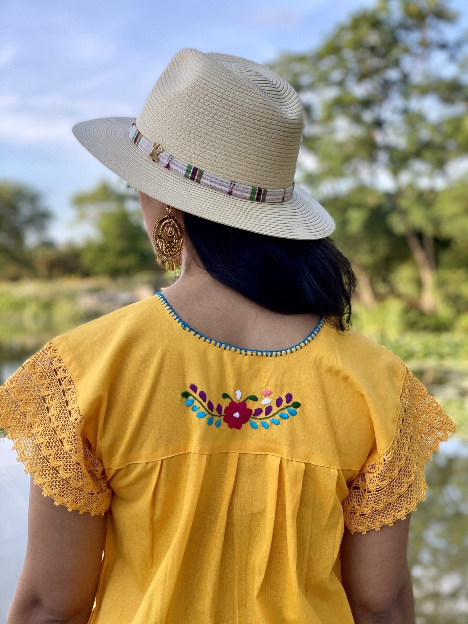 Colorful floral mexican dress. Floral Embroidered Mexican Dress with beautiful lace details on the sleeve and lower part of the skirt. - Solei Store