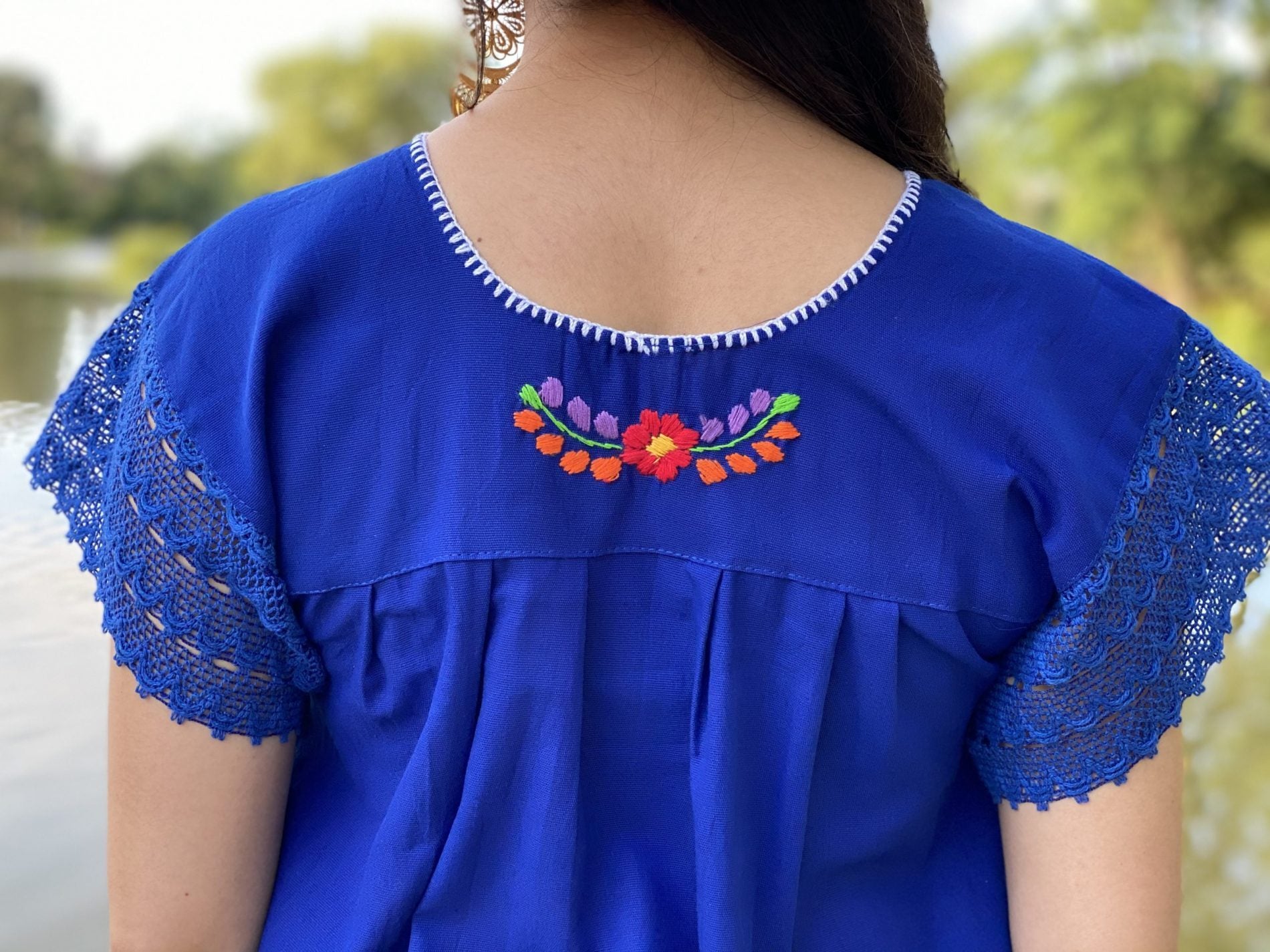 Colorful floral mexican dress. Floral Embroidered Mexican Dress with beautiful lace details on the sleeve and lower part of the skirt. - Solei Store