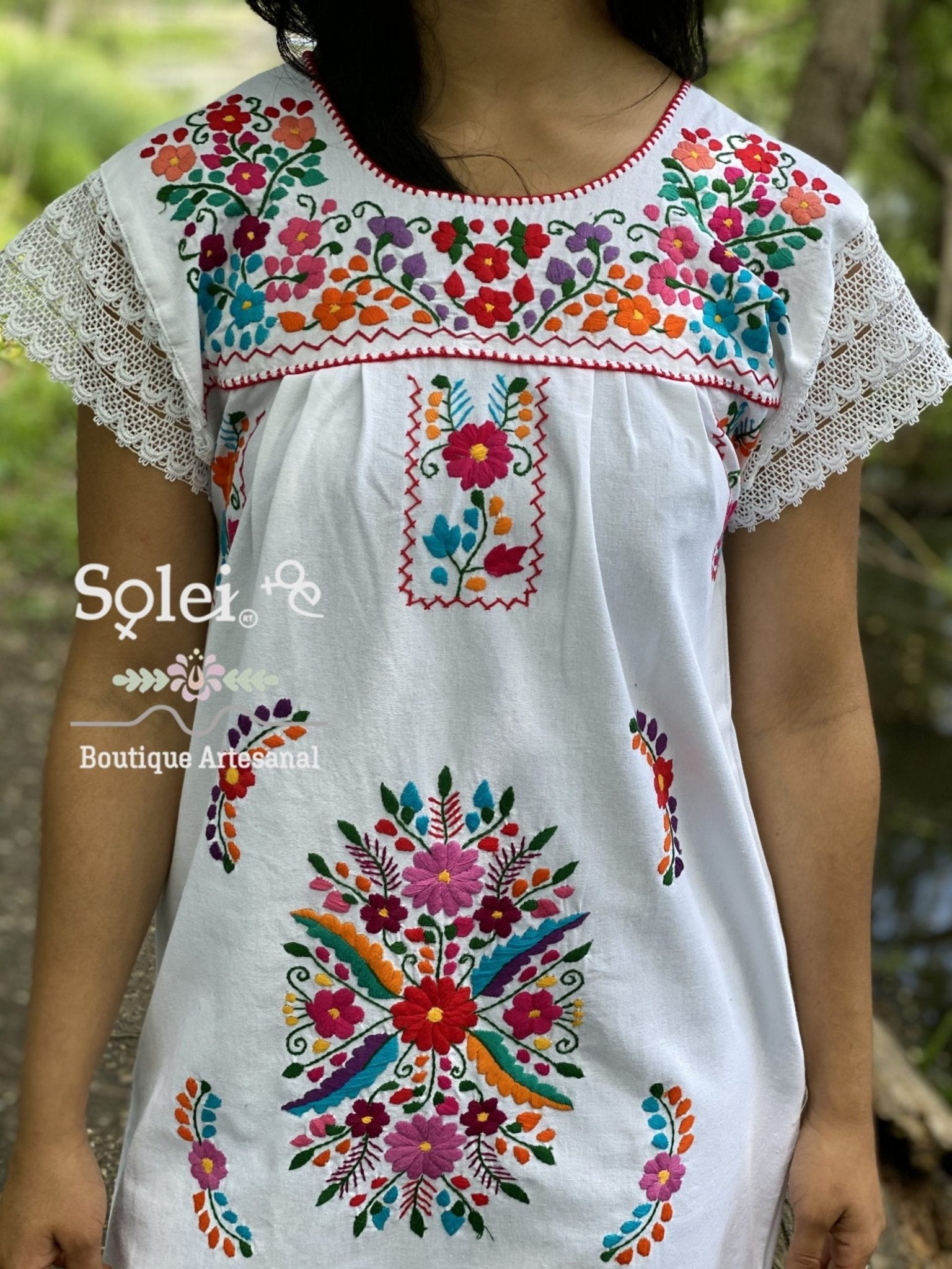 Colorful floral mexican dress. Floral Embroidered Mexican Dress with beautiful lace details on the sleeve and lower part of the skirt. - Solei Store